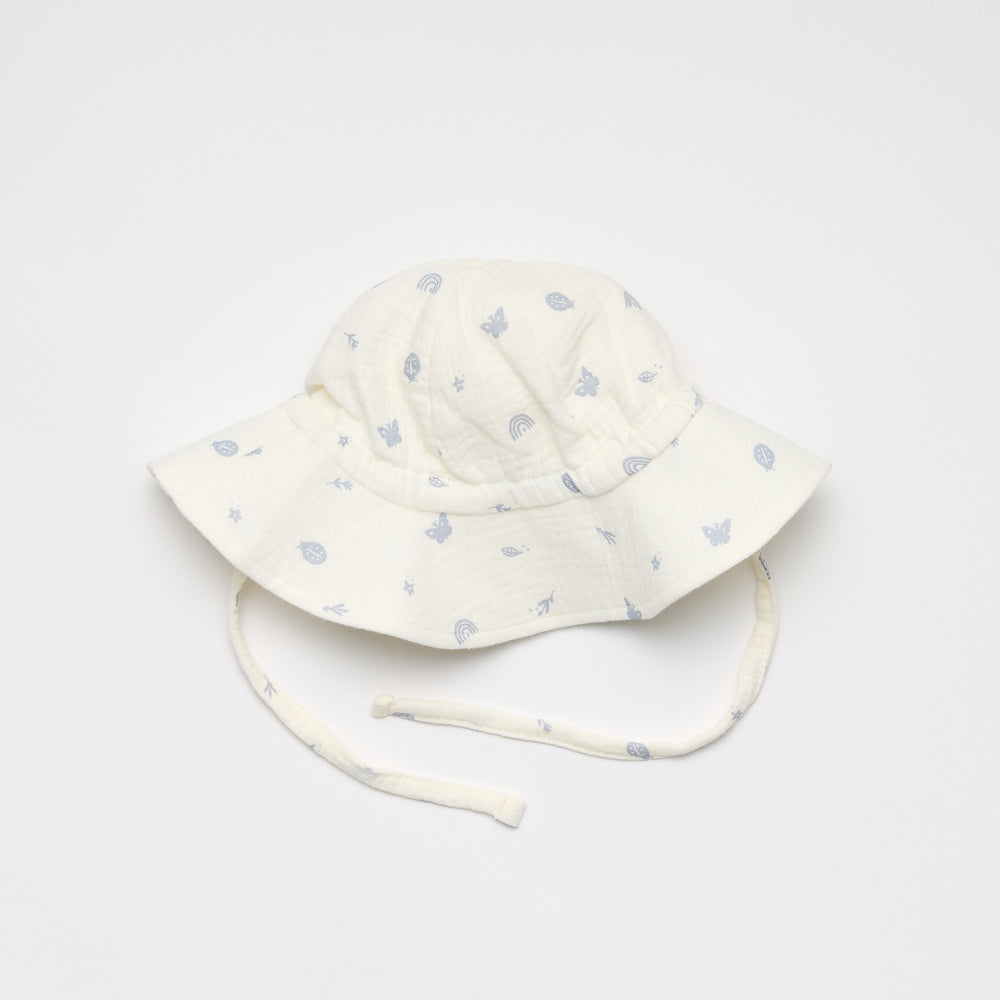 Baby sun hat with enchanted garden print in blue 