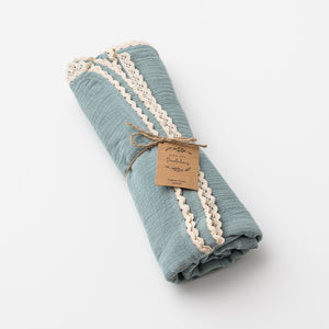 Organic muslin swaddle with lace in sage